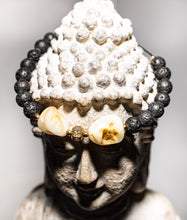 Load image into Gallery viewer, Heavy shell stone, held together by little Buddha
